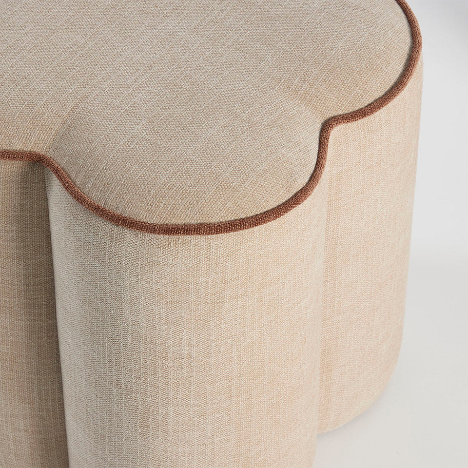 Juno Ottomans upholstered in a stunning natural textured fabric, the sculptural silhouette of the Juno brings a touch of whimsy while maintaining a refined, modern edge. With a piped edge detailing outlining each petal-like curve, this upholstered ottoman is perfect as a footrest, extra seating or a decorative accent. Rockhampton Vintage Hire