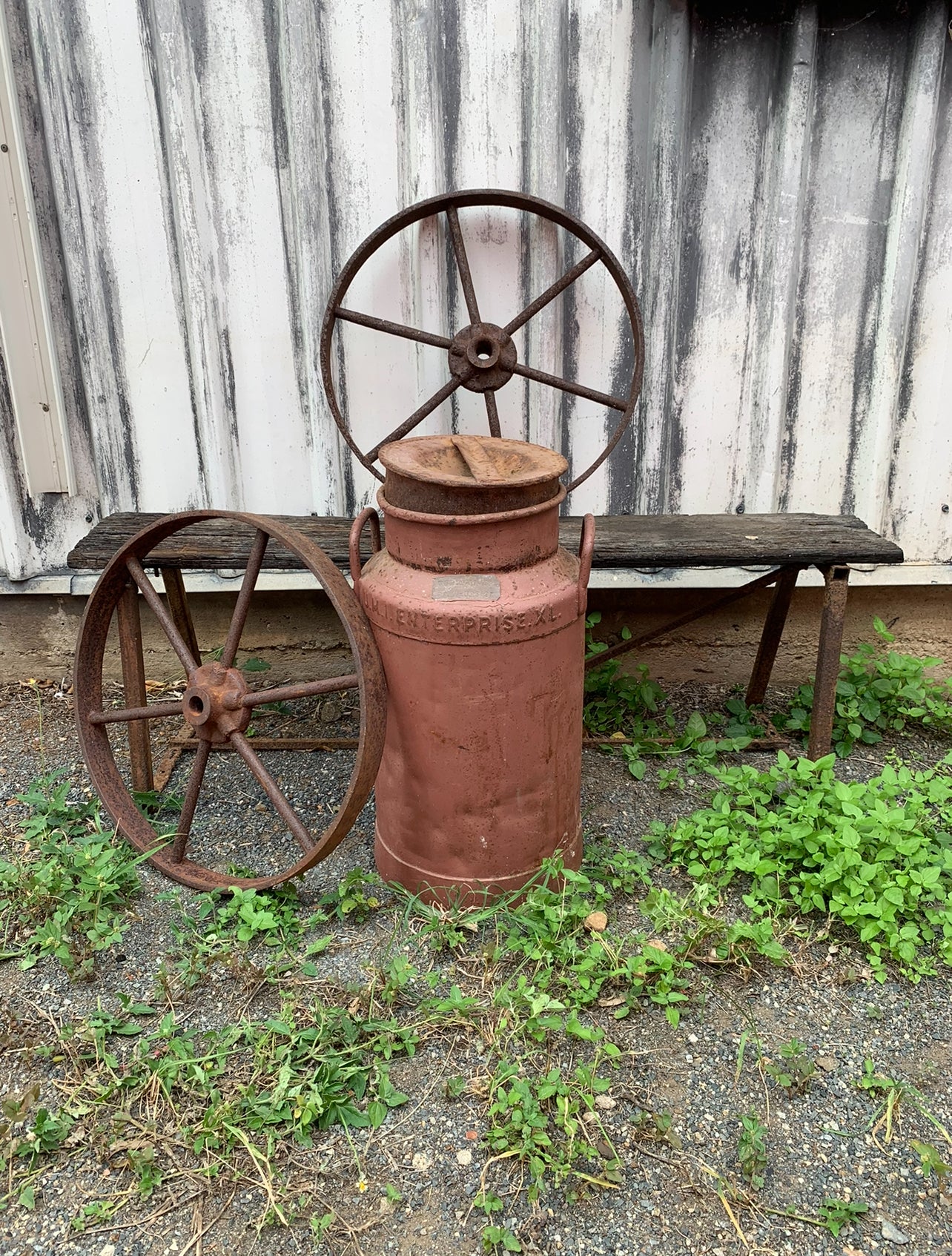 RVH Vintage Rusty Cream Can & steel wheel Props Rockhampton Vintage Hire