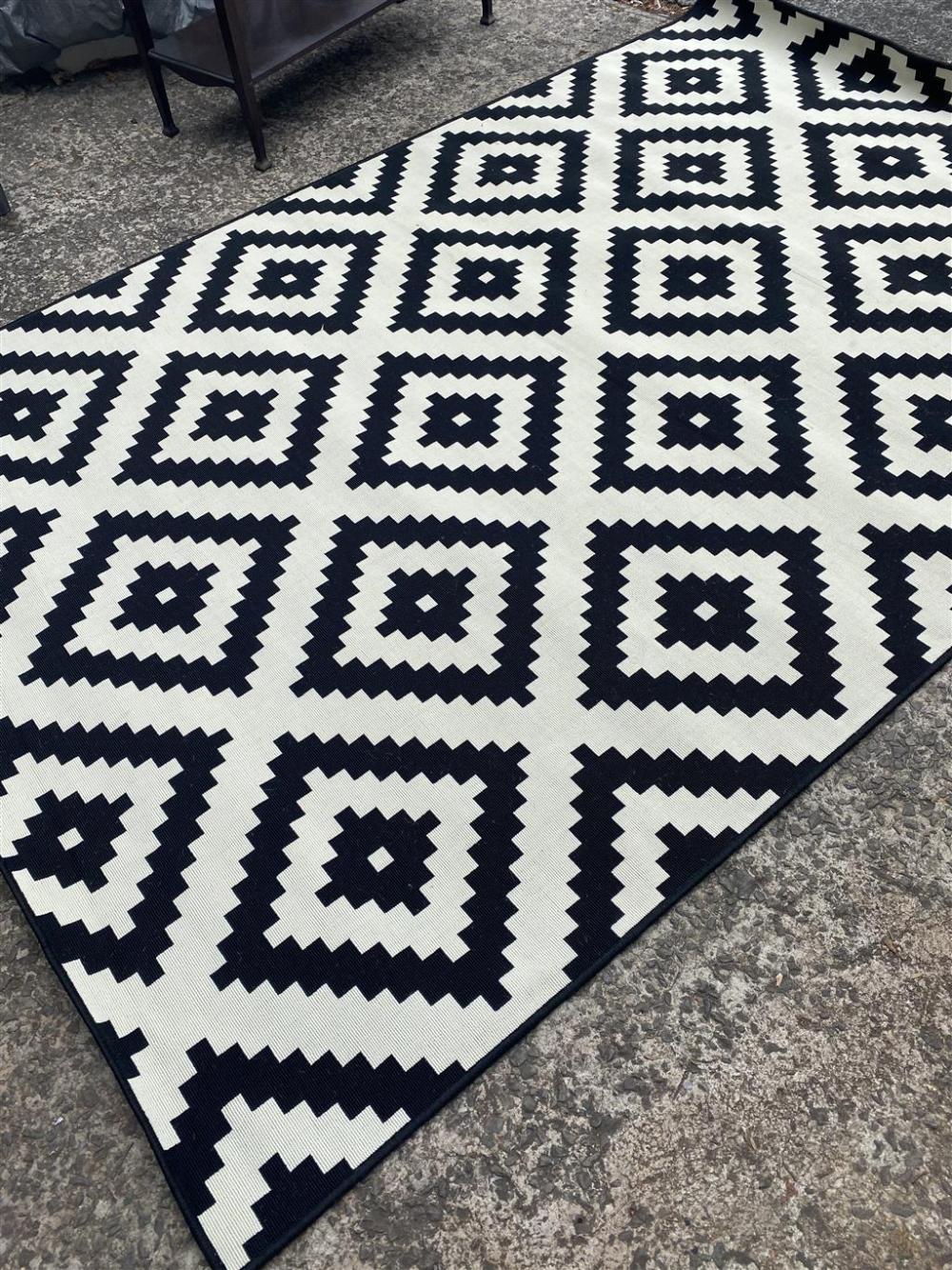 Black & White area rug, perfect for lounge/chill out zone set ups. Rockhampton Vintage Hire
