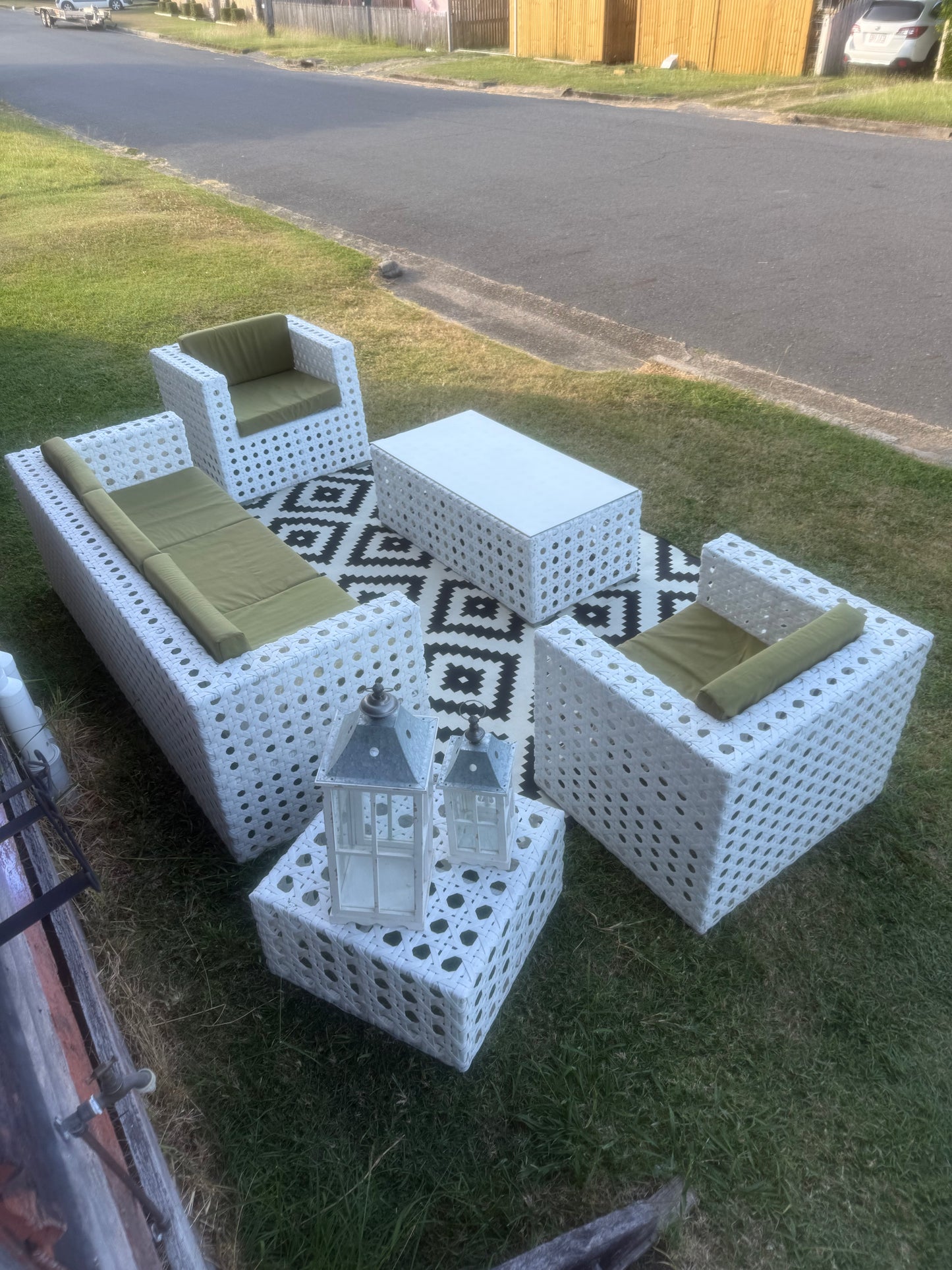 White Woven Lounge, armchairs with olive green seat cushions & tables 5-Piece Setting. Rockhampton Vintage Hire