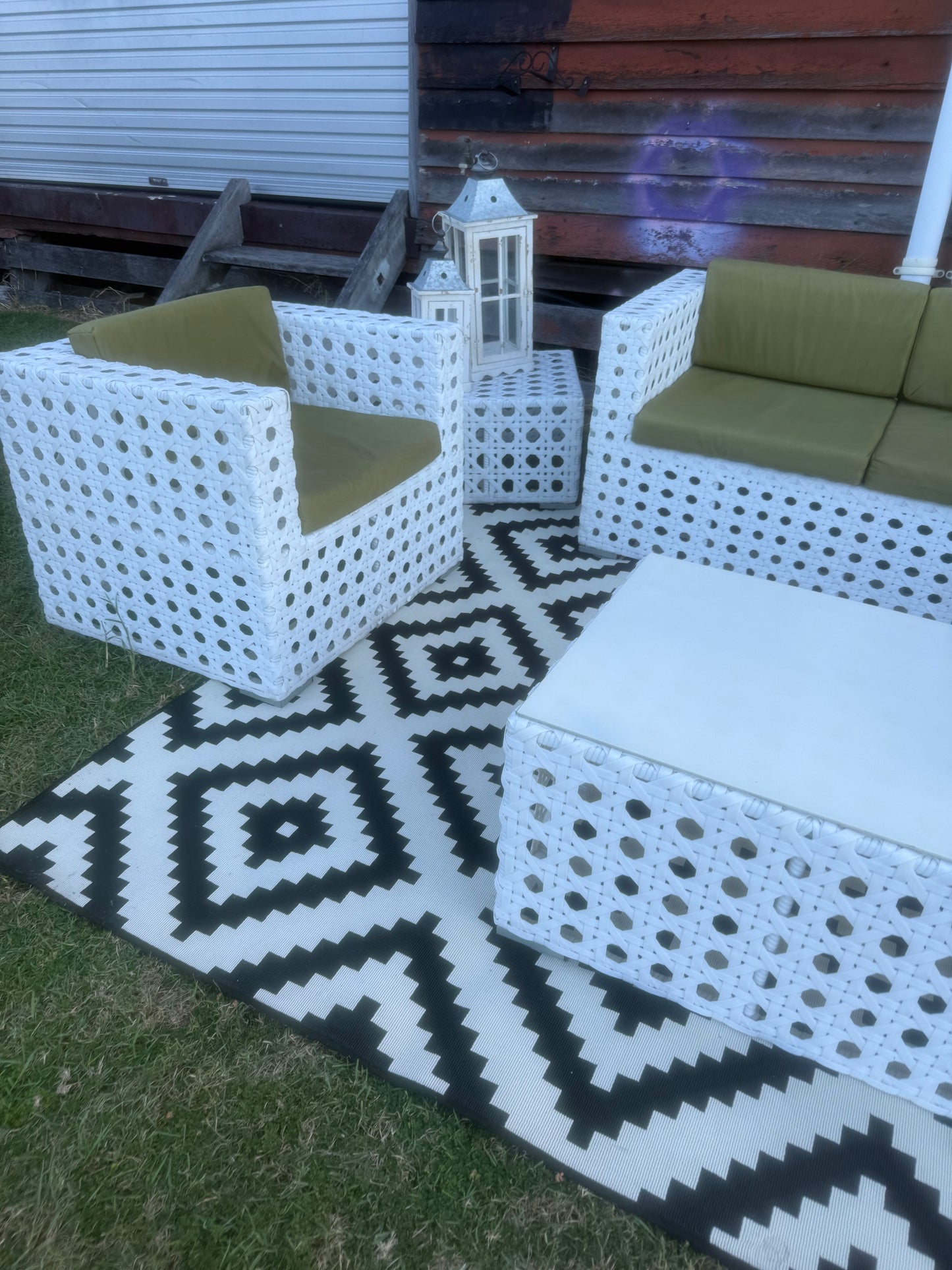 White Woven Lounge, armchairs with olive green seat cushions & tables 5-Piece Setting. Rockhampton Vintage Hire