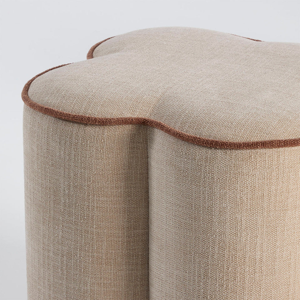 Juno Ottomans upholstered in a stunning natural textured fabric, the sculptural silhouette of the Juno brings a touch of whimsy while maintaining a refined, modern edge. With a piped edge detailing outlining each petal-like curve, this upholstered ottoman is perfect as a footrest, extra seating or a decorative accent.  Rockhampton Vintage Hire