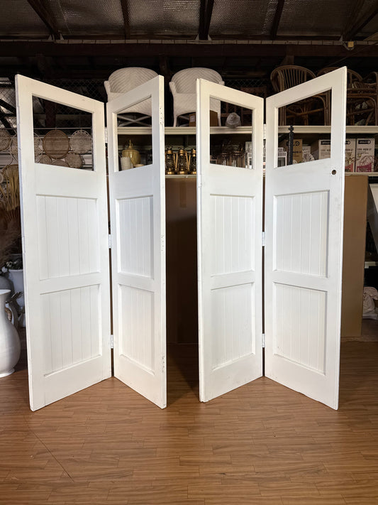 These doors are hinged in pairs, giving you flexible options for your event setup. You can use one pair (double doors) on its own, or both pairs together as a four-panel backdrop wall—perfect for a bar backdrop, party photo booth or behind a bridal table. Rockhampton Vintage Hire