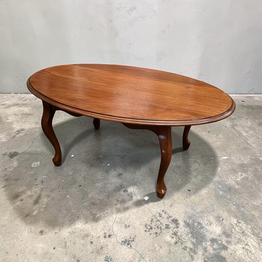 Vintage oval timber coffee table with polished timber top, mix and match with our vintage furniture. Rockhampton Vintage Hire