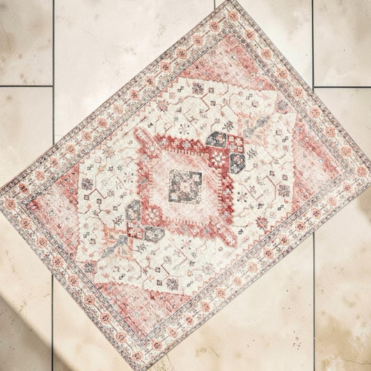 This large rug has a combination of pink, creamed and natural colours mixed in a gorgeous on trend print. Rockhampton Vintage Hire